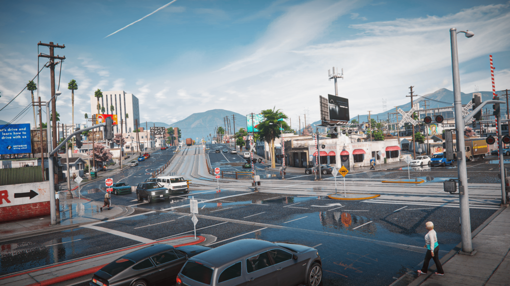 The bustling urban city of GTA V, captured during a bright, clear day. 